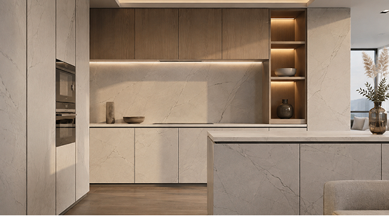 Modern kitchen featuring seamless white stone veneer kitchen joinery, countertops, and minimalist integrated cabinetry